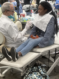 Dr. Ron Palmer consulting with a patient.